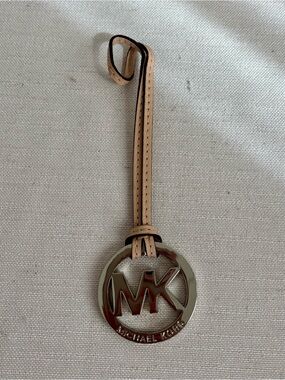 Michael Kors Beige Leather Strap with Silver MK Logo